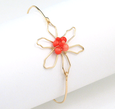 Flower silhouette and pink coral cluster bangle bracelet